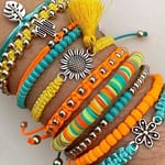 Summer accessories: Beaded bracelets – Stackable beaded bracelets in vibrant colour can complement your summer tan and add a bohemian vibe to your outfit!